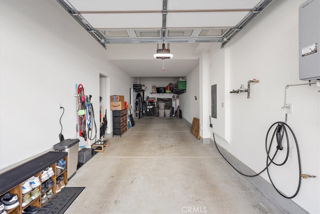 11063 Wander Drive Rancho Cucamonga, CA 91730 - Photo 25 of 28 Tandem Garage w/ dual EV Charging and storage