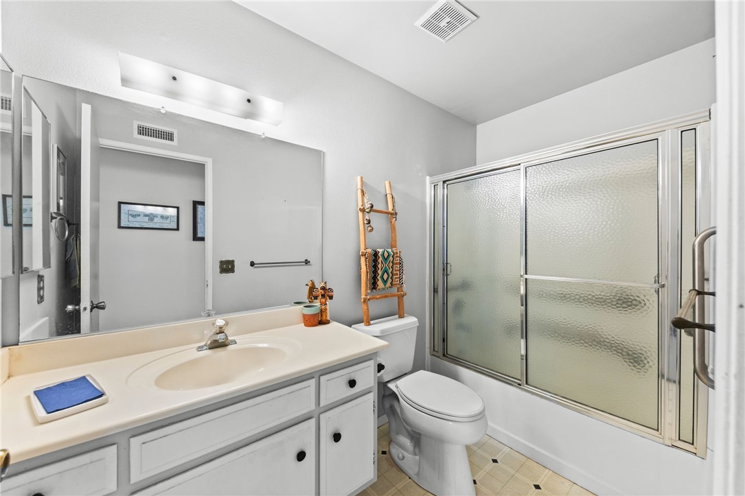 1981 Chevy Chase Drive Brea, CA 92821 - Photo 18 of 52 a bathroom with a sink toilet and shower