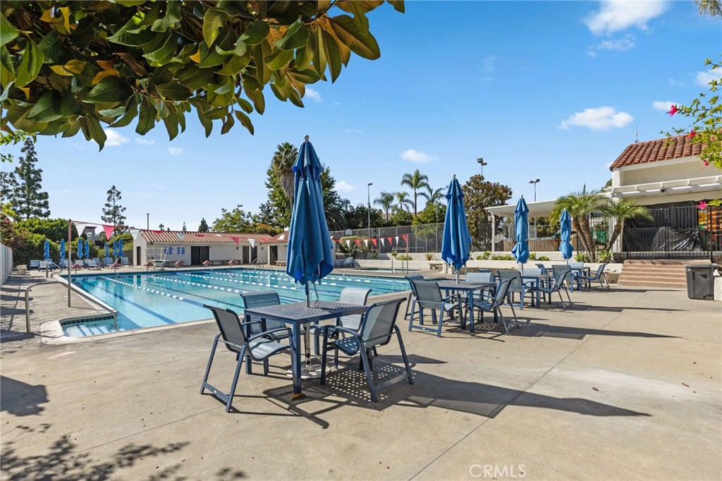 1981 Chevy Chase Drive Brea, CA 92821 - Photo 31 of 52 a view of a patio with table and chairs and potted plants