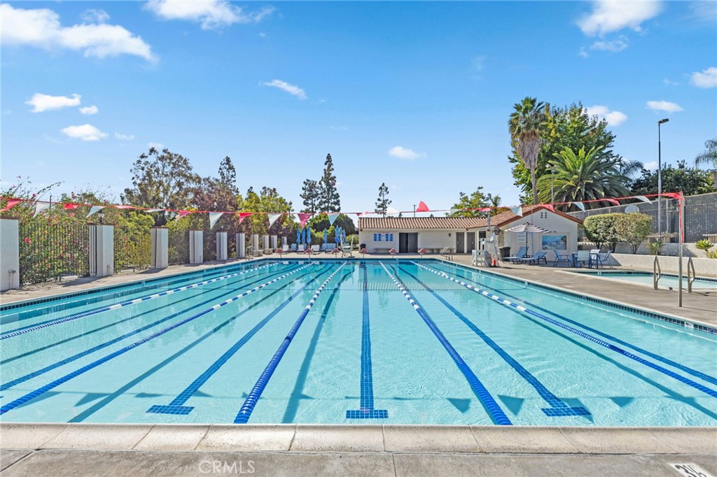 1981 Chevy Chase Drive Brea, CA 92821 - Photo 33 of 52 a view of a swimming pool with a lounge chairs