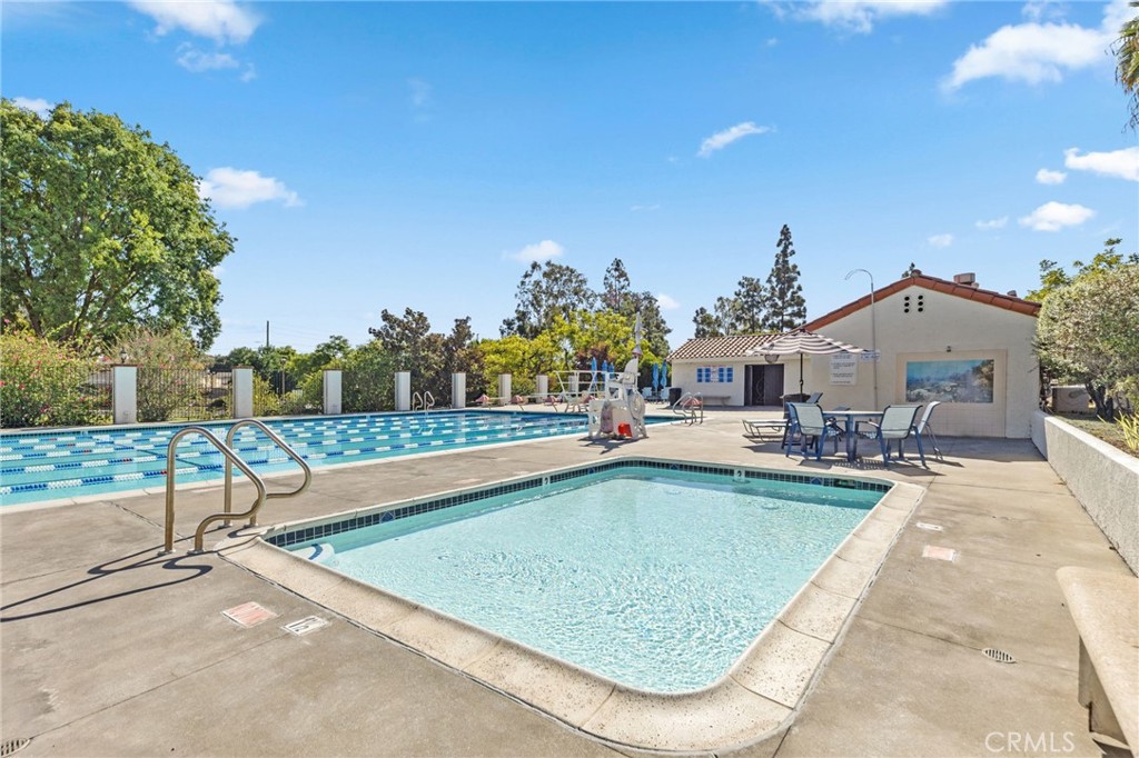1981 Chevy Chase Drive Brea, CA 92821 - Photo 34 of 52 a view of a house with swimming pool and sitting area