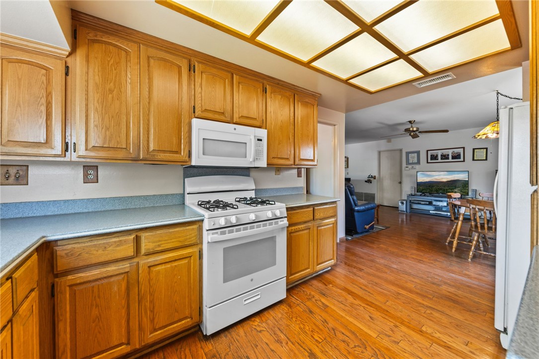 1981 Chevy Chase Drive Brea, CA 92821 - Photo 46 of 52 a kitchen with stainless steel appliances granite countertop a stove a sink dishwasher and a refrigerator