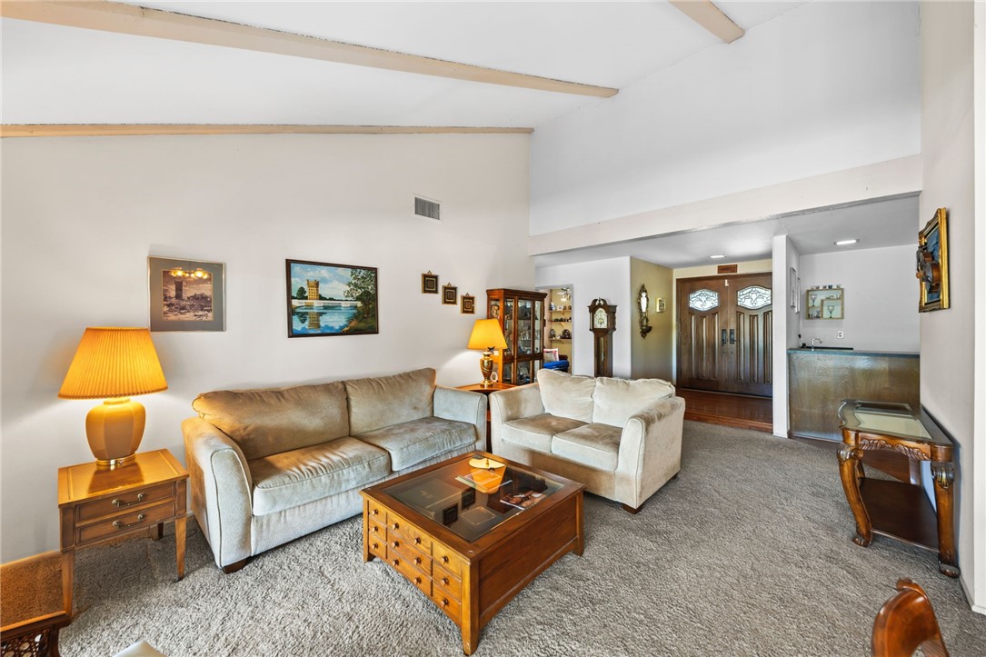 1981 Chevy Chase Drive Brea, CA 92821 - Photo 47 of 52 a living room with furniture and a lamp