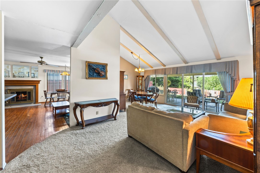 1981 Chevy Chase Drive Brea, CA 92821 - Photo 6 of 52 a living room with furniture a fireplace and a flat screen tv