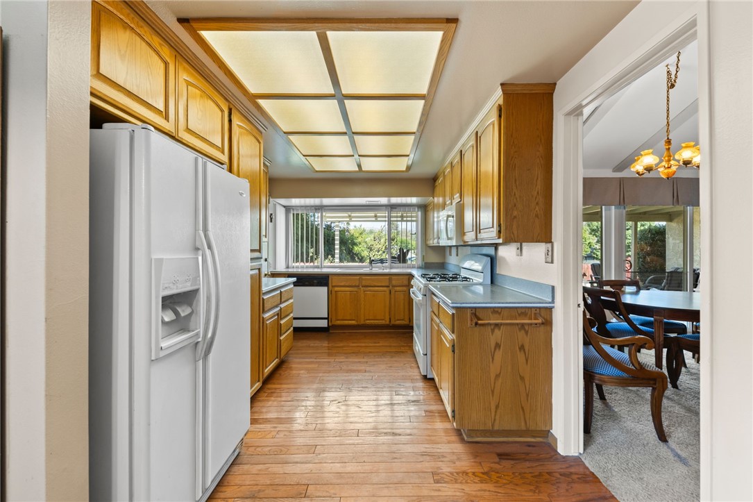 1981 Chevy Chase Drive Brea, CA 92821 - Photo 10 of 52 a kitchen with stainless steel appliances granite countertop a refrigerator and a stove