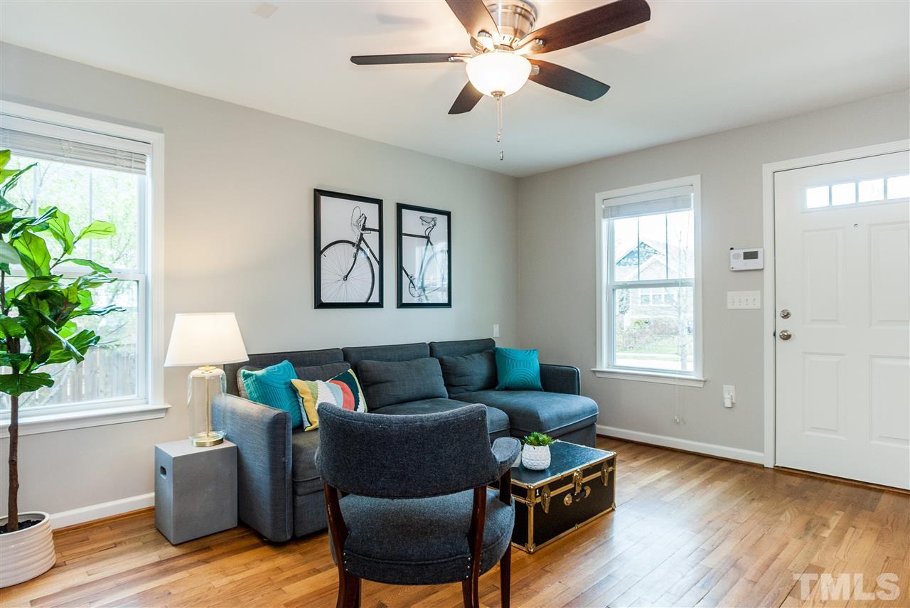 904 Dorothy Sanders Way Raleigh, NC 27601 - Photo 4 of 25 a living room with furniture and a window