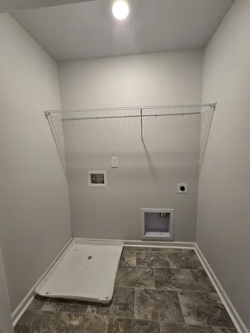 a view of a room with racks on the wall