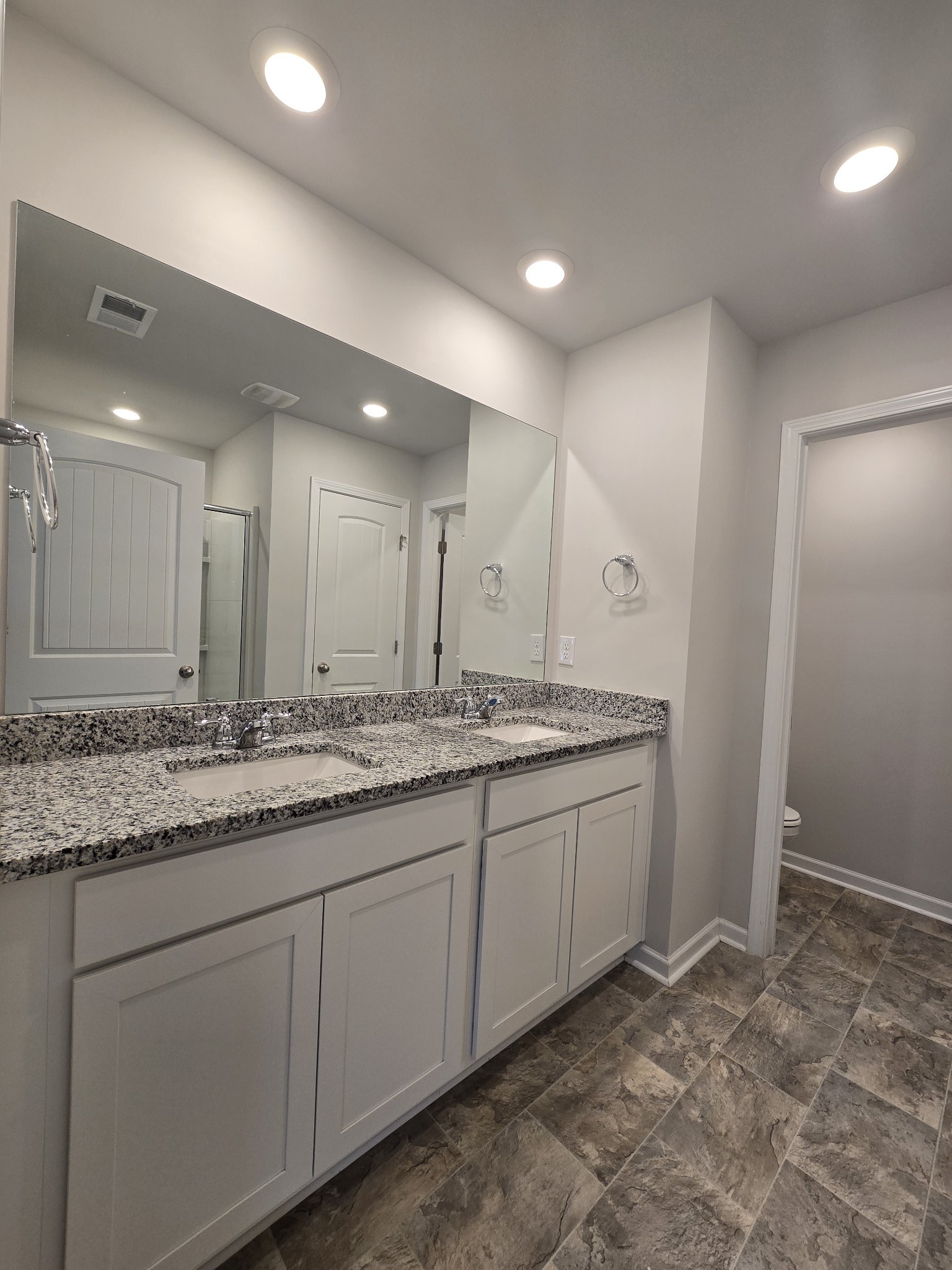 603 Clifford Heights Columbia, TN 38401 - Photo 8 of 15 a bathroom with a granite countertop sink and a mirror