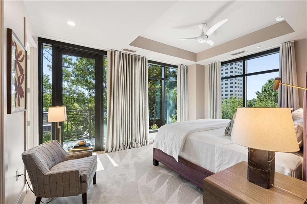 2520 Peachtree Road, Unit 603 Atlanta, GA 30305 - Photo 45 of 91 a bedroom with a large bed and a couch