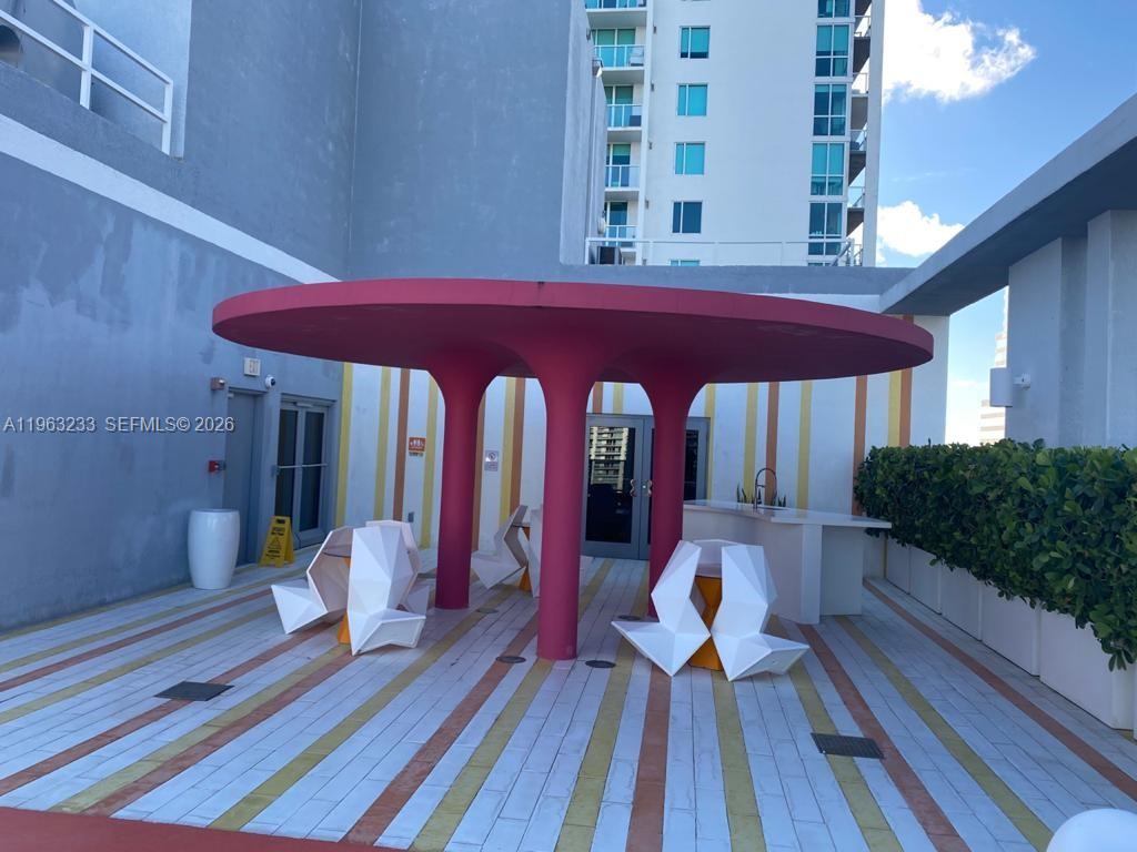 31 Southeast 6th Street, Unit 1404 Miami, FL 33131 - Photo 12 of 13 a view of balcony with sitting area