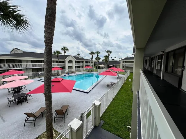 a view of outdoor kitchen and patio