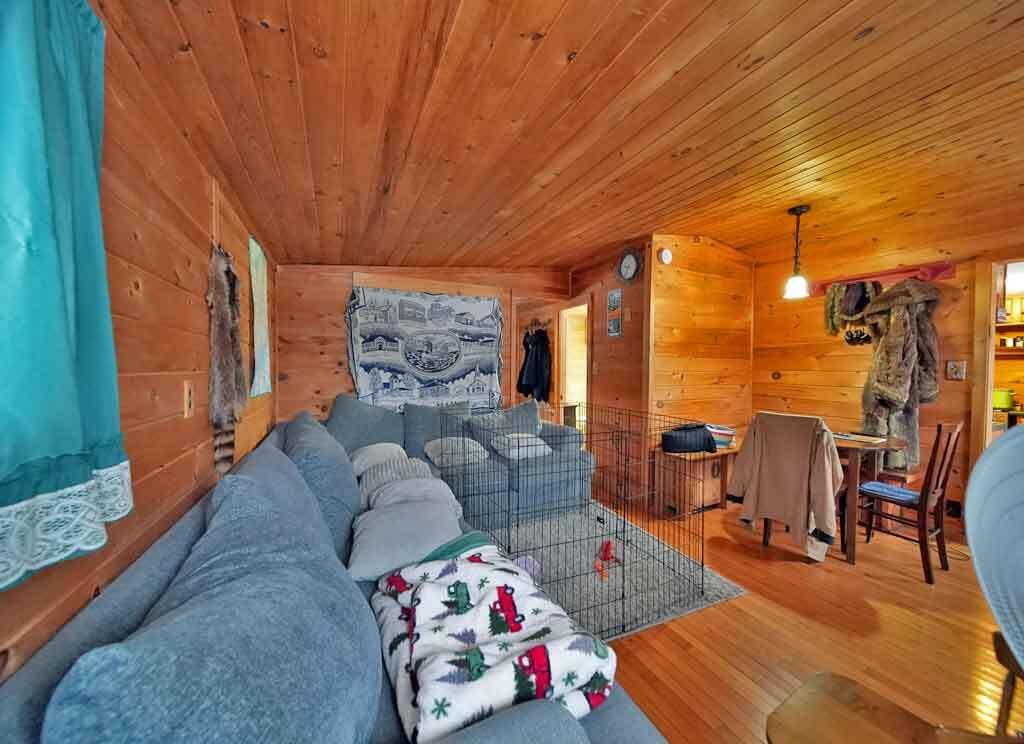 12 Stone House Drive Patten, ME 04765 - Photo 17 of 43 knotty-pine-living-room