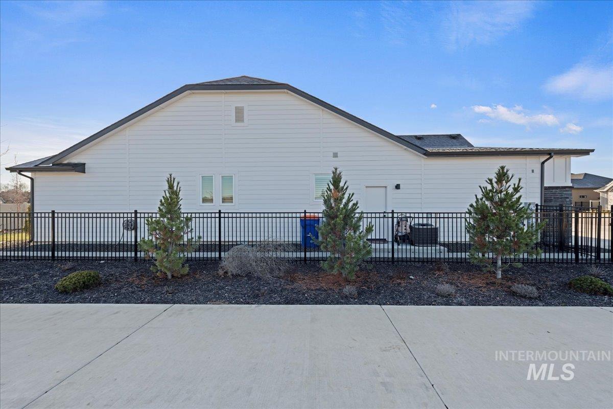 280 North Boulder Rdg Way Eagle, ID 83616 - Photo 42 of 50 View of home's exterior with a central air condition unit and a patio area