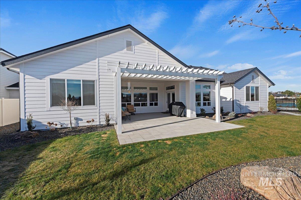 280 North Boulder Rdg Way Eagle, ID 83616 - Photo 44 of 50 Rear view of property with a pergola and a patio area