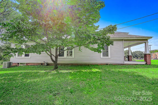 a house view with a garden space