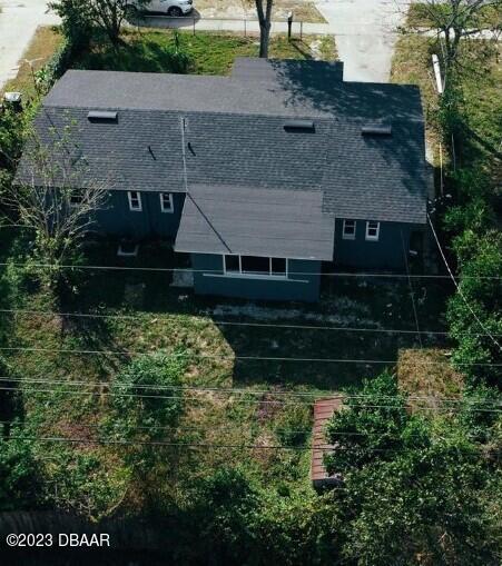 823 Berkshire Road Daytona Beach, FL 32117 - Photo 13 of 13 a aerial view of a house with a yard