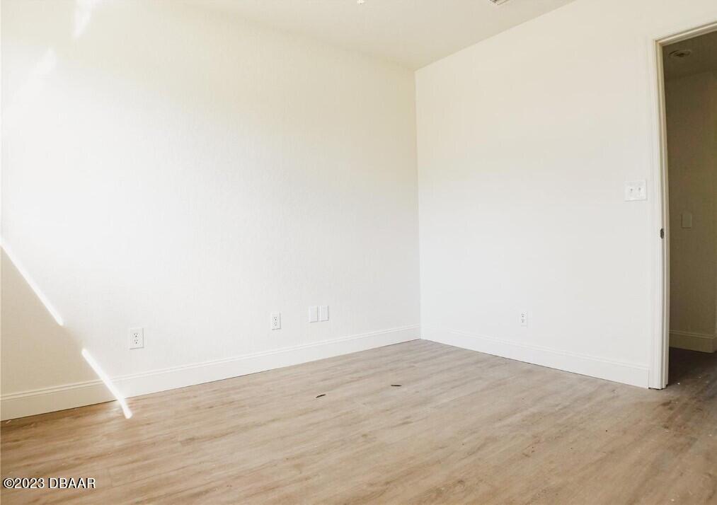823 Berkshire Road Daytona Beach, FL 32117 - Photo 10 of 13 a view of an empty room