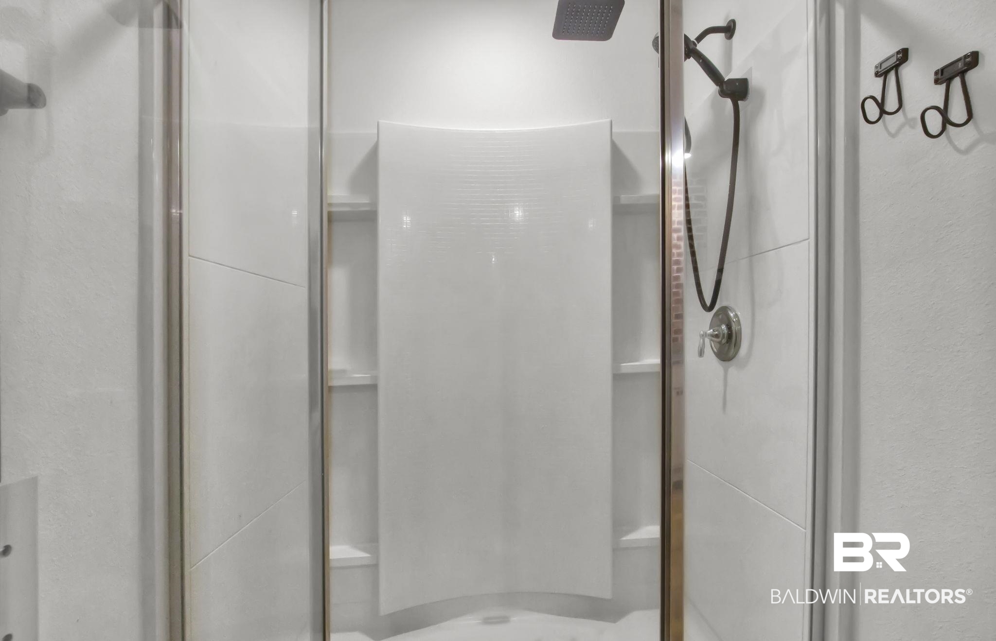 23810 Unbridled Loop Daphne, AL 36526 - Photo 21 of 50 Bathroom featuring a shower with door
