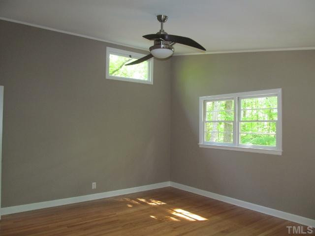 3444 Rugby Road Durham, NC 27707 - Photo 10 of 24 Large master bedroom has vaulted ceiling, hardwood flooring and great natural light.