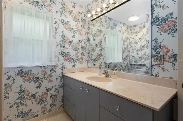 a view of an house with backyard space and garden