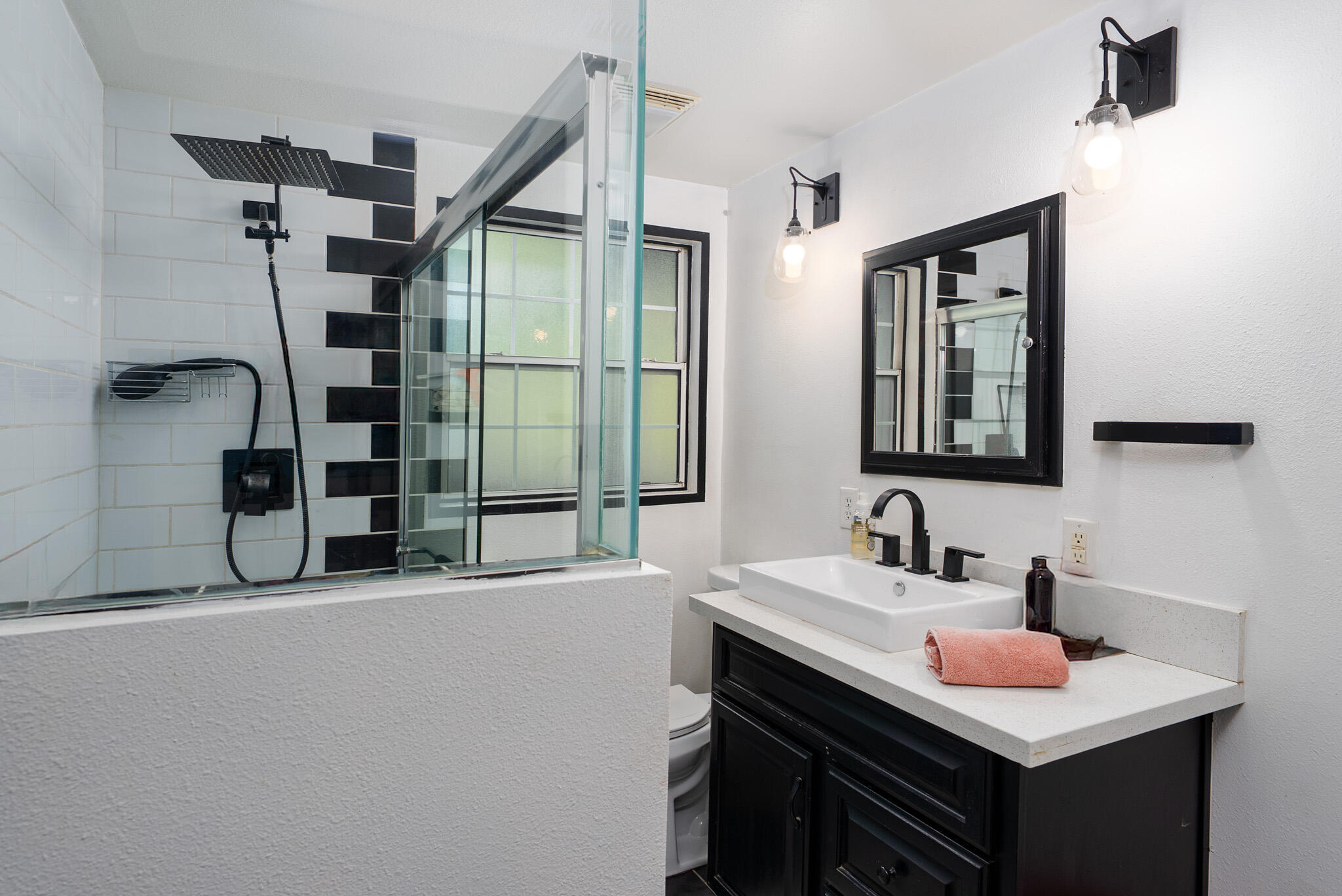 3882 East Sunny Dunes Road Palm Springs, CA 92264 - Photo 18 of 34 a bathroom with a sink and a mirror