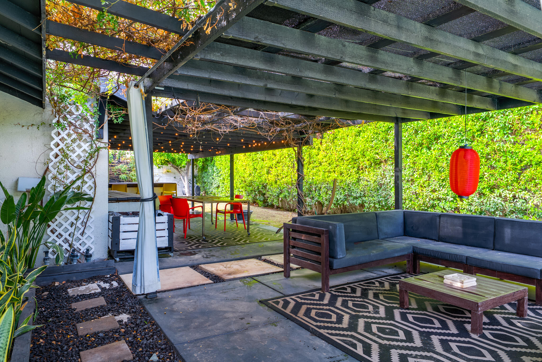 3882 East Sunny Dunes Road Palm Springs, CA 92264 - Photo 26 of 34 a outdoor living space with patio furniture and a potted plant