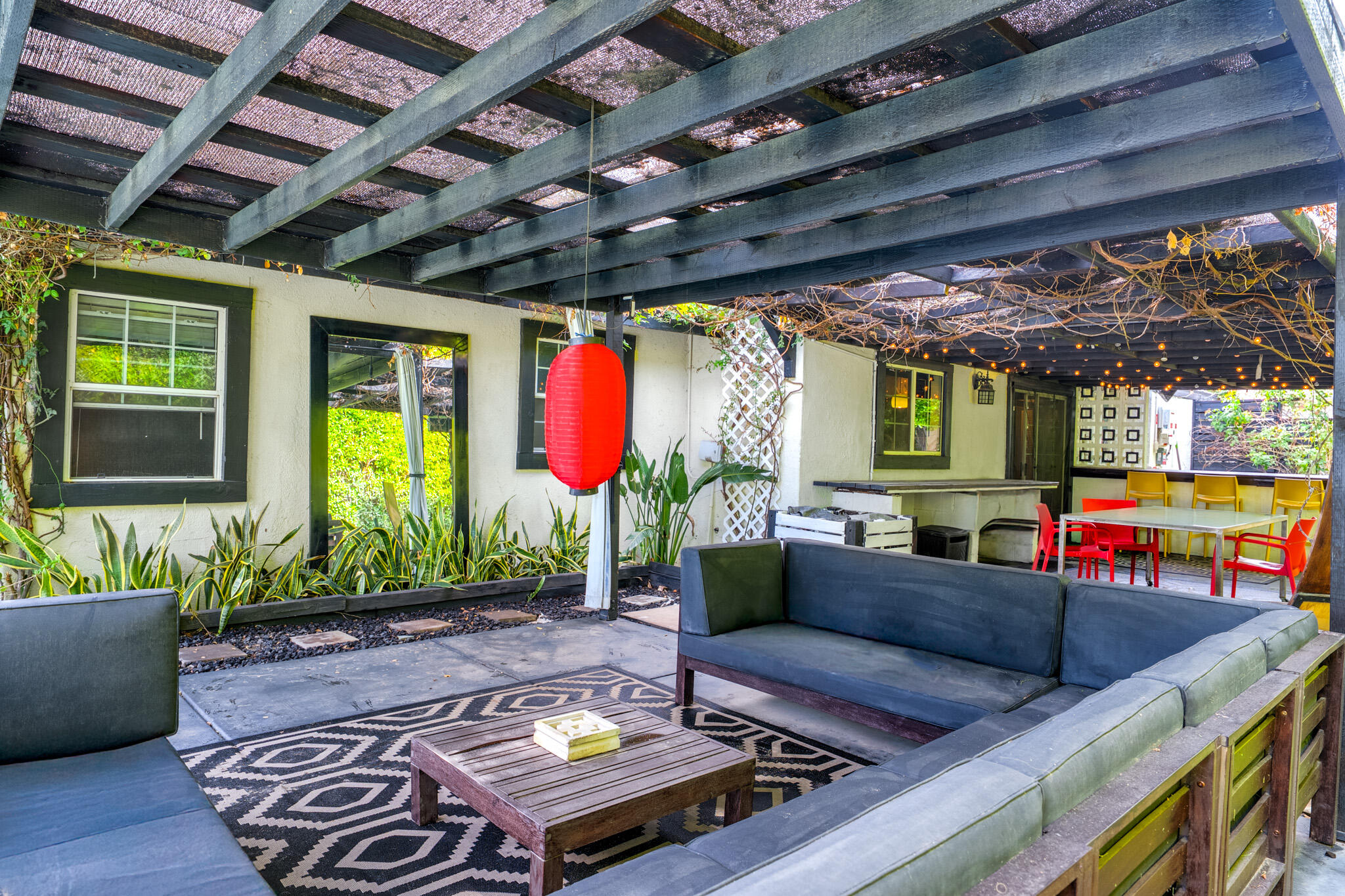 3882 East Sunny Dunes Road Palm Springs, CA 92264 - Photo 27 of 34 a outdoor living space with furniture and a fireplace