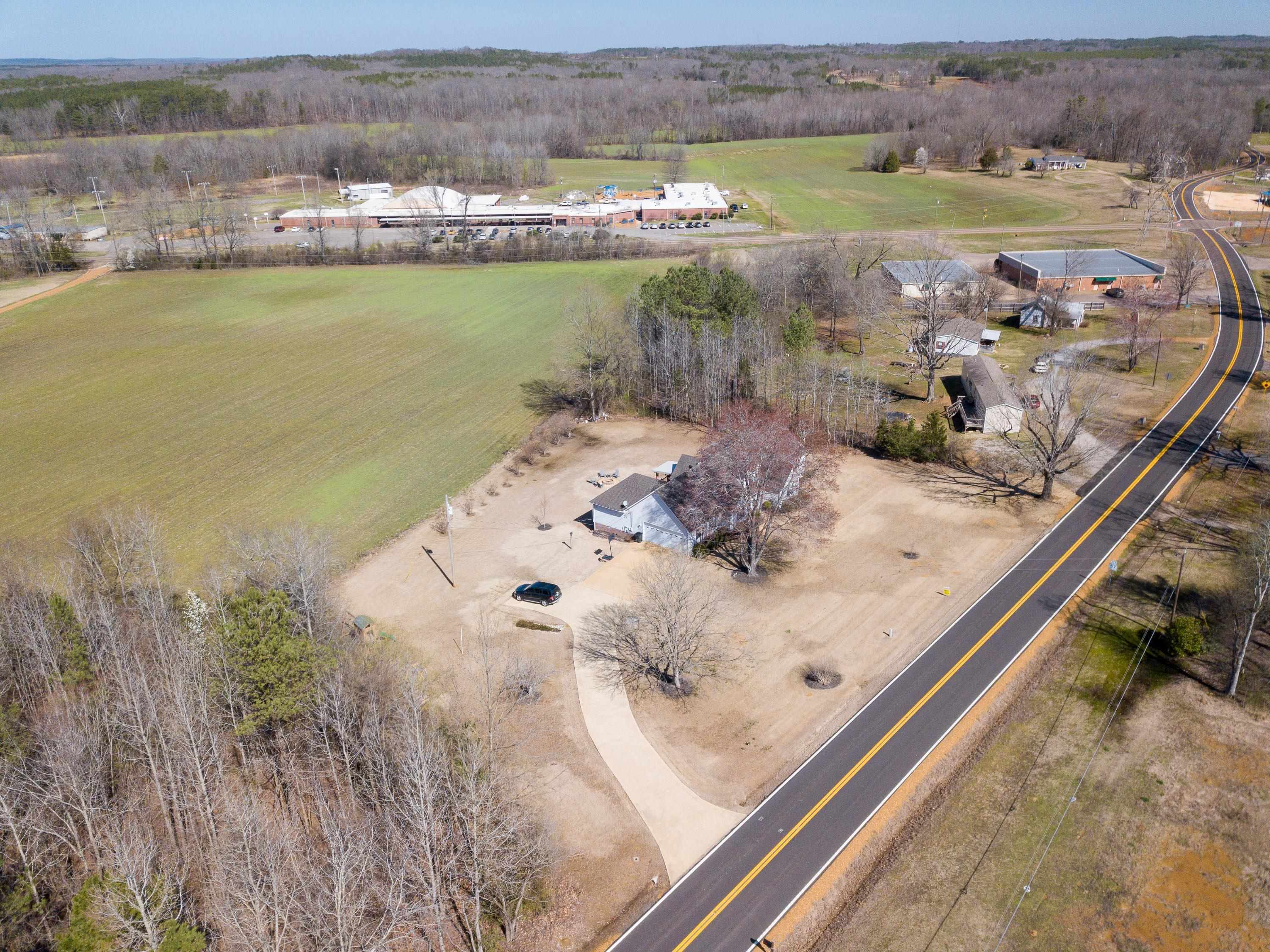 6843 Michie Pebble Hill Road Michie, TN 38357 - Photo 24 of 25 a view of a lake with outdoor space