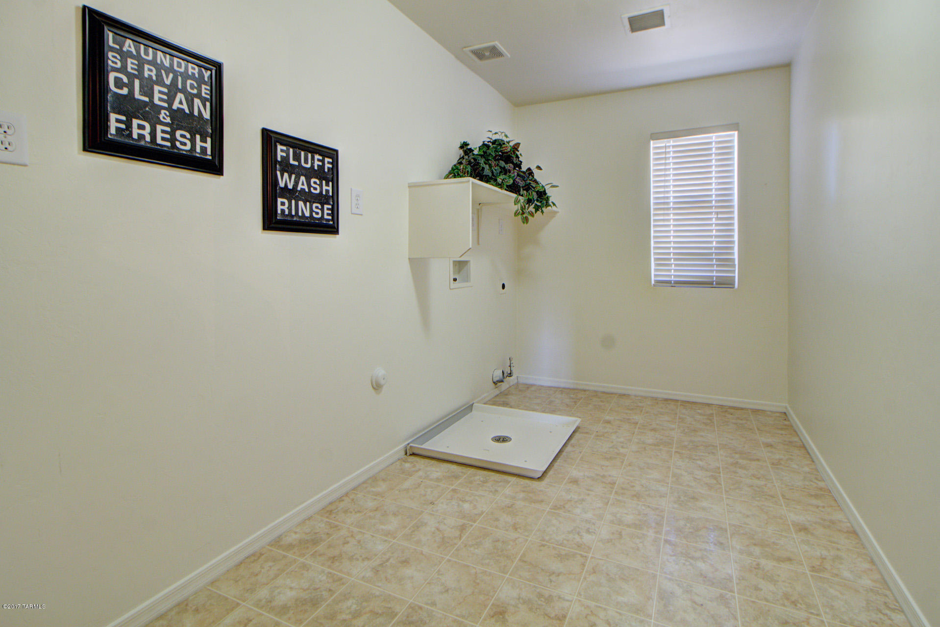 3588 East Mecate Road Tucson, AZ 85739 - Photo 26 of 36 an entryway with a window