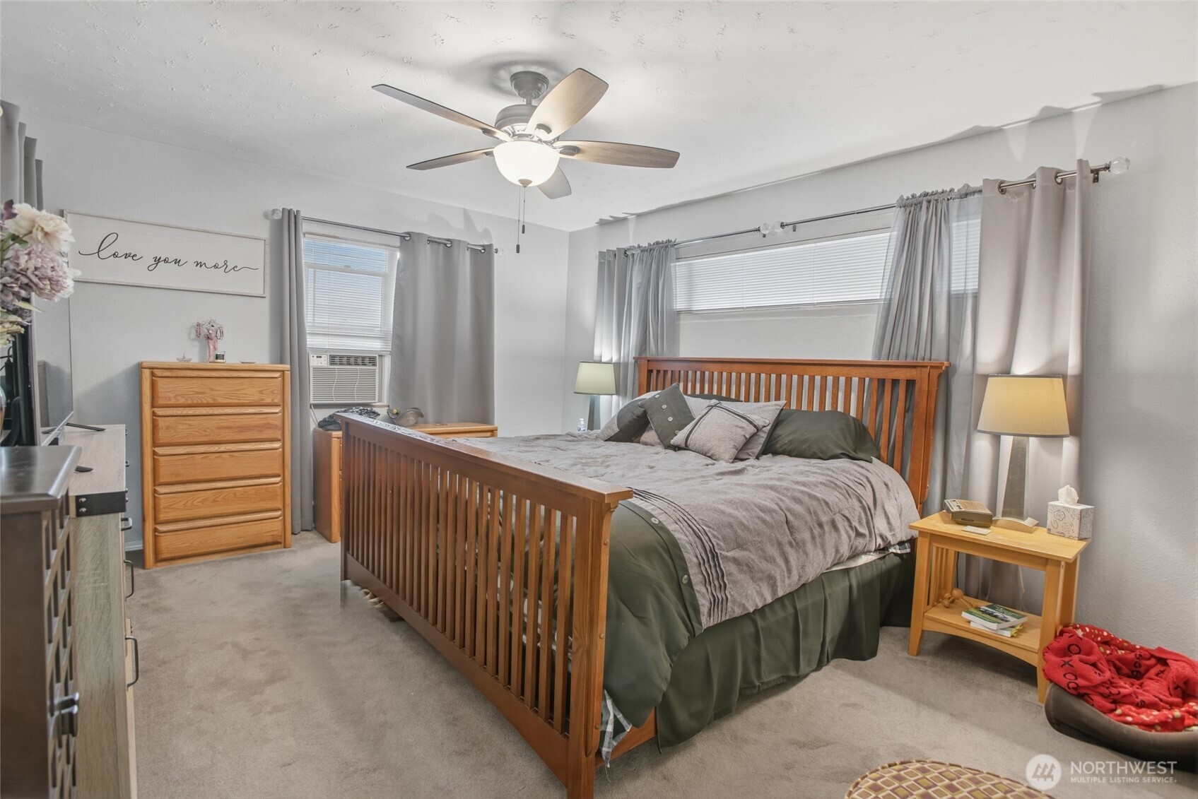 2748 Field Street Longview, WA 98632 - Photo 24 of 39 a bedroom with a bed and a chandelier