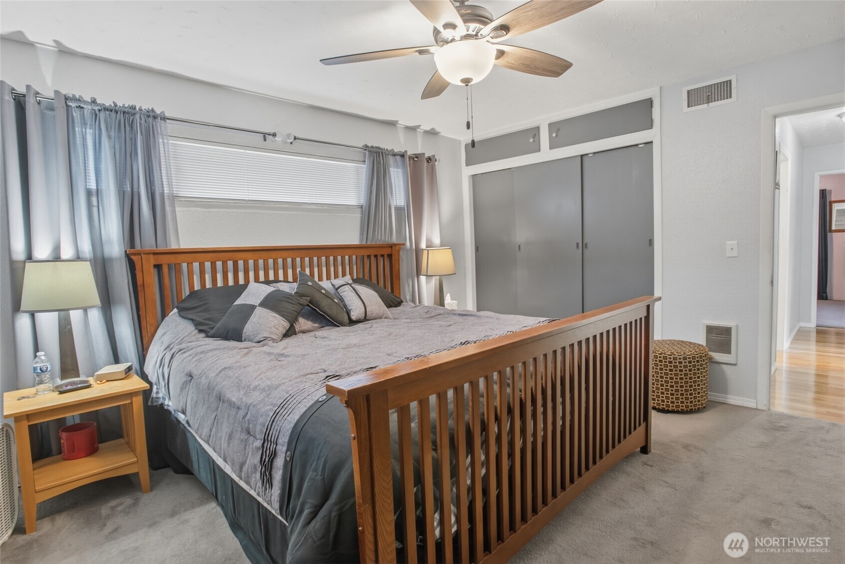 2748 Field Street Longview, WA 98632 - Photo 25 of 39 a bedroom with a bed and a chandelier