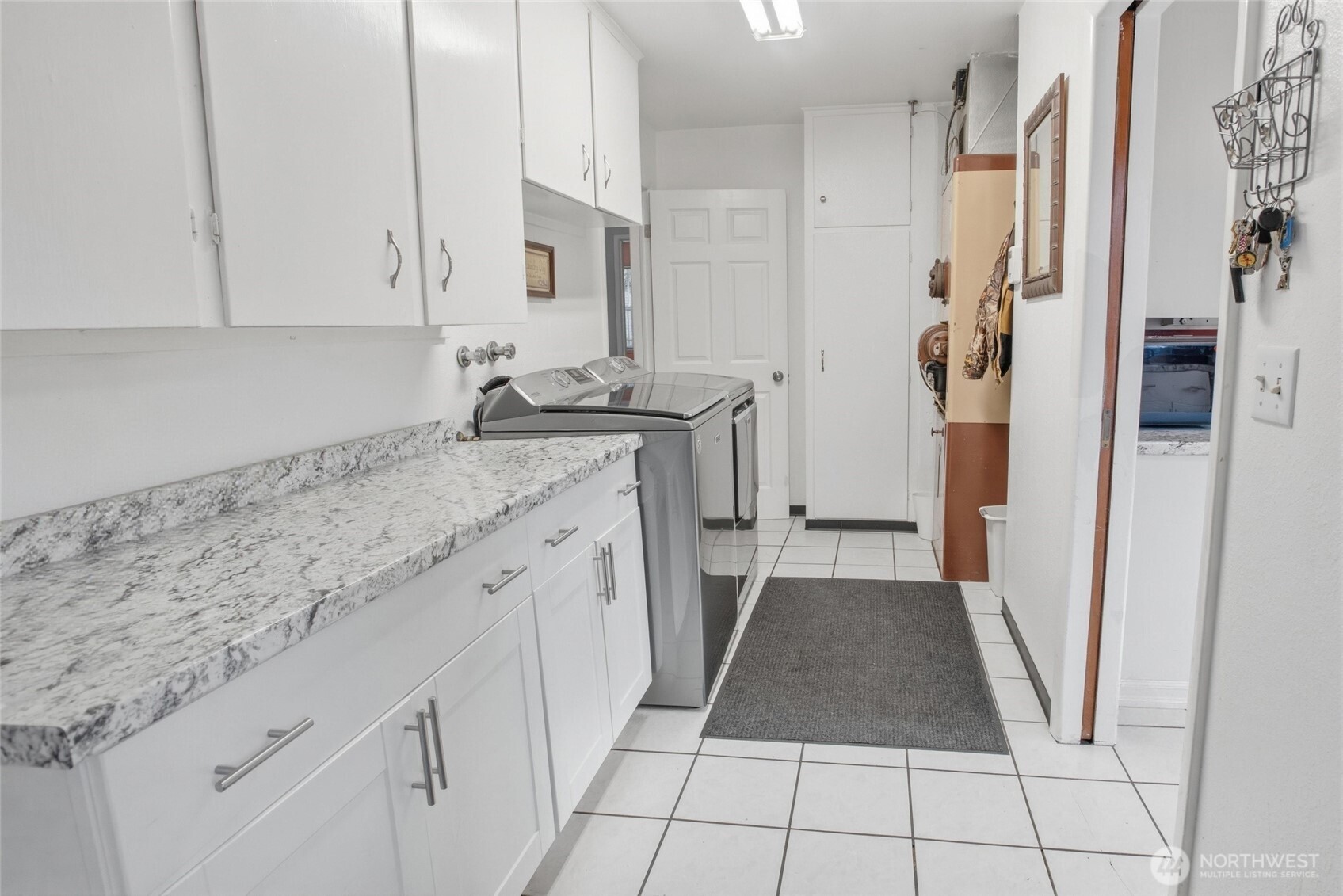 2748 Field Street Longview, WA 98632 - Photo 26 of 39 a kitchen with stainless steel appliances granite countertop a refrigerator and a sink
