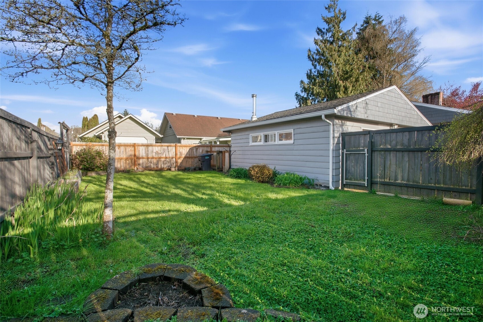 2748 Field Street Longview, WA 98632 - Photo 35 of 39 a view of a yard in front of a house with large tree