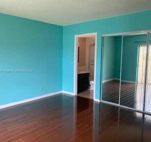 a view of hallway with shower
