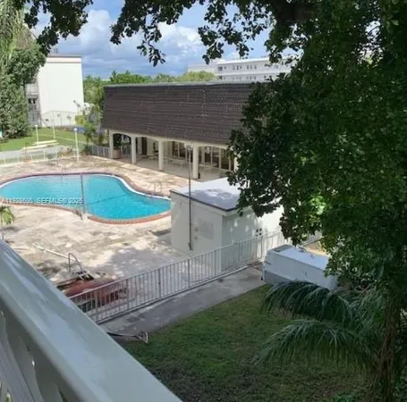 a view of house with outdoor space and sitting area