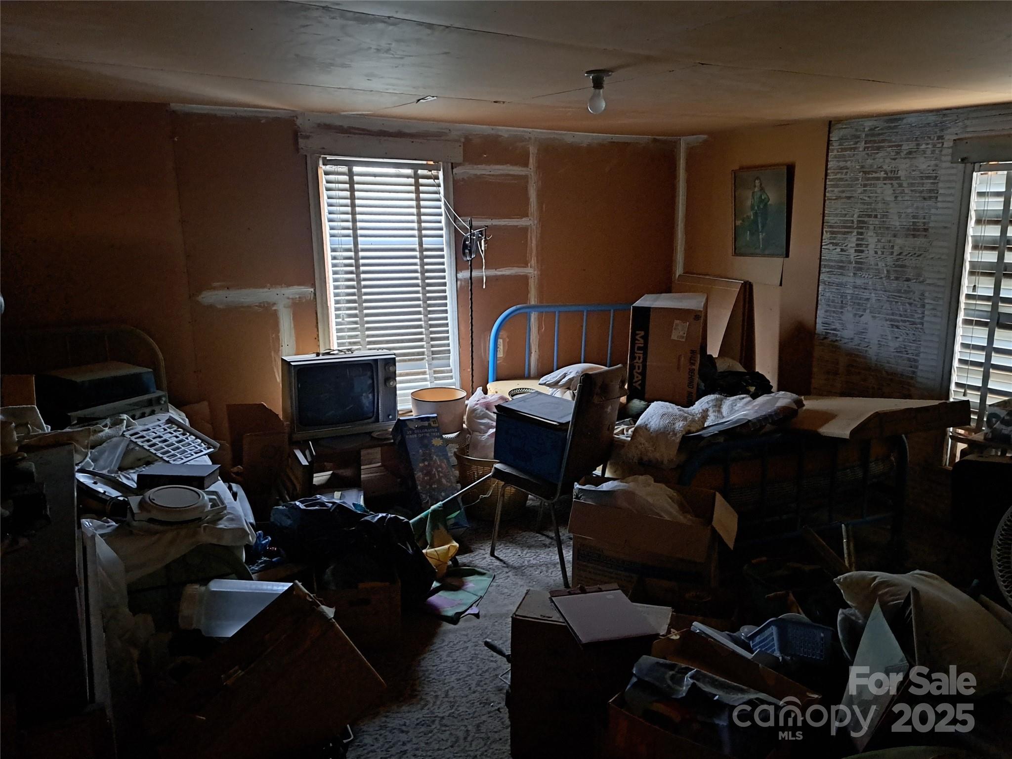 101 Knight Drive Clyde, NC 28721 - Photo 17 of 26 a view of a workspace with furniture and a window