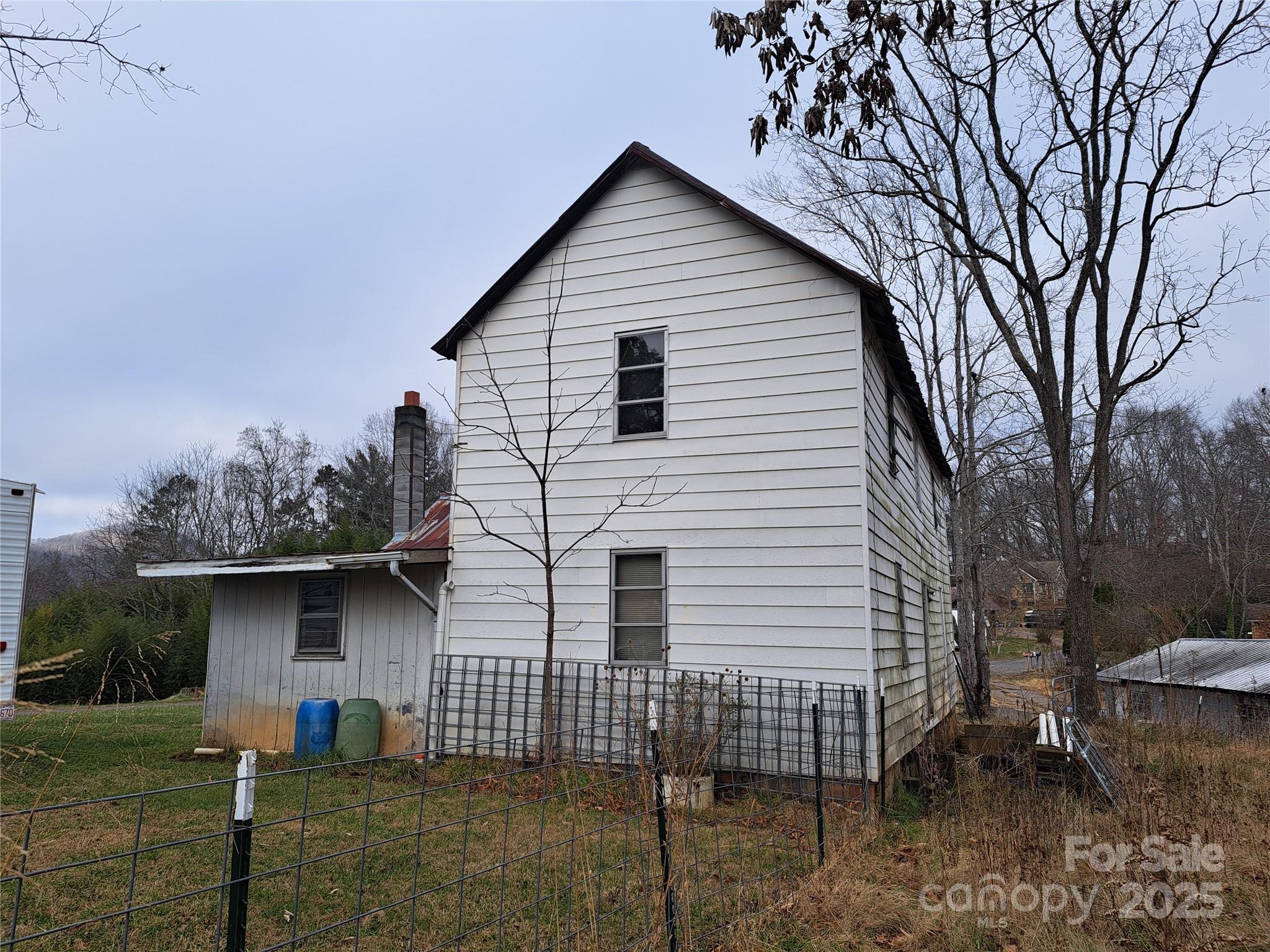 101 Knight Drive Clyde, NC 28721 - Photo 2 of 26 a front view of a house with a yard