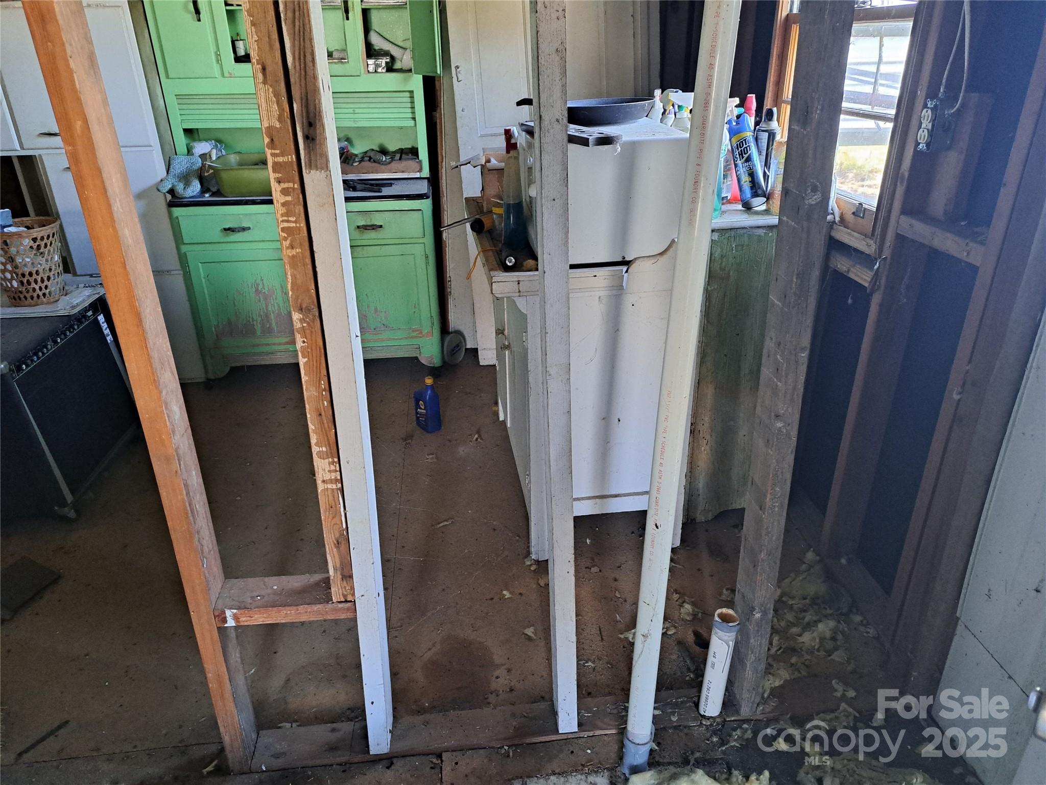 101 Knight Drive Clyde, NC 28721 - Photo 25 of 26 a view of walk in closet with clothes