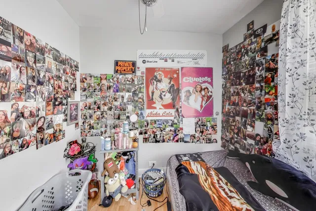 a bedroom with furniture and a bed