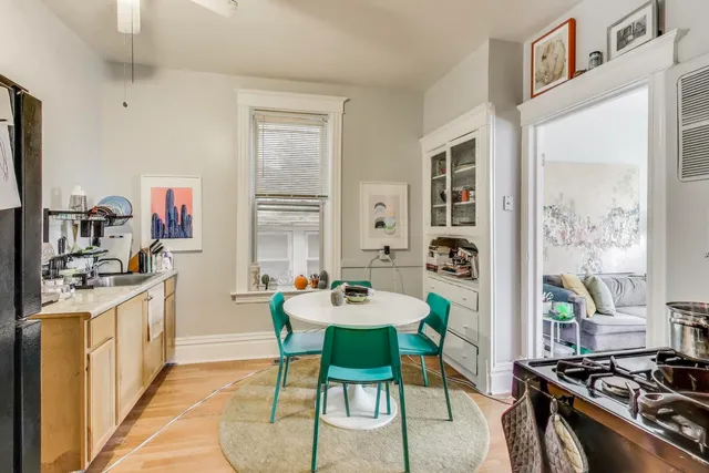 a kitchen with stainless steel appliances granite countertop a refrigerator and a stove