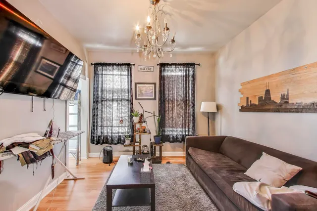 a picture of a bench in front of white wall