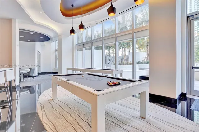 a room with table and chairs