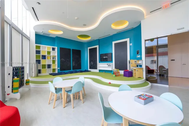 a swimming pool with outdoor seating and yard