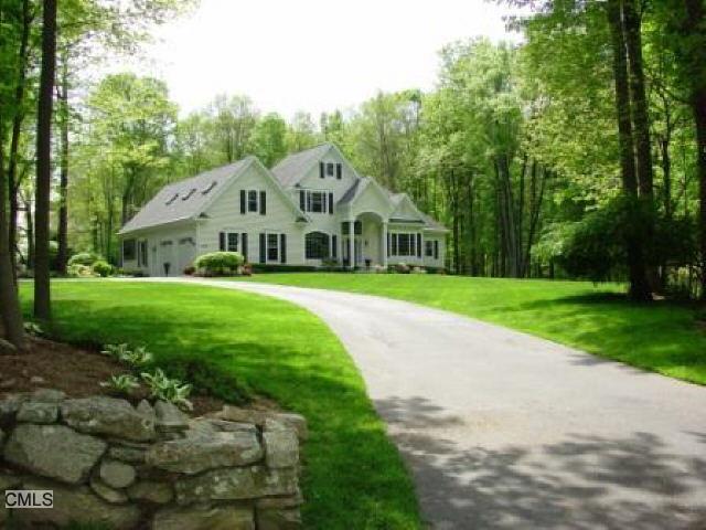 147 Seir Hill Road Wilton, CT 06897 - Photo 1 of 1 a view of a white house in front of a big yard with large trees