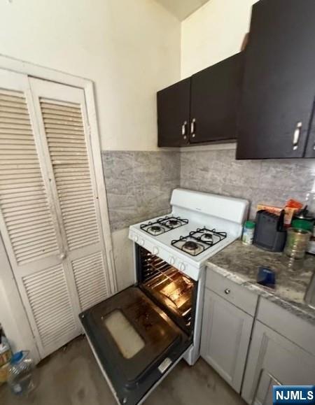 286 North 6th Street Prospect Park, NJ 07508 - Photo 11 of 15 a kitchen with appliances and cabinets