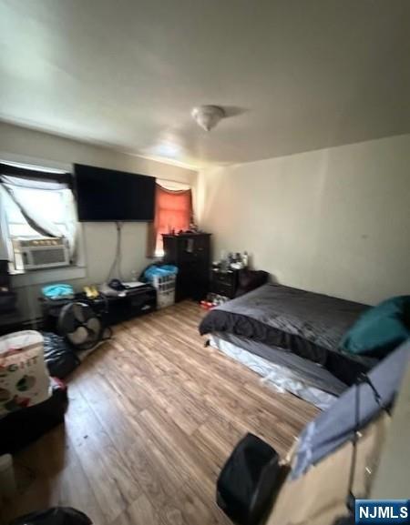 286 North 6th Street Prospect Park, NJ 07508 - Photo 14 of 15 a living room with furniture and a flat screen tv