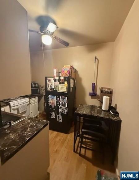 286 North 6th Street Prospect Park, NJ 07508 - Photo 4 of 15 a view of a workspace with furniture