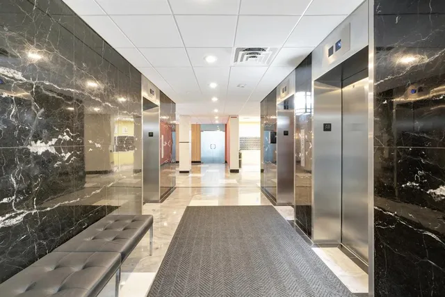a view of a livingroom with a bookshelf