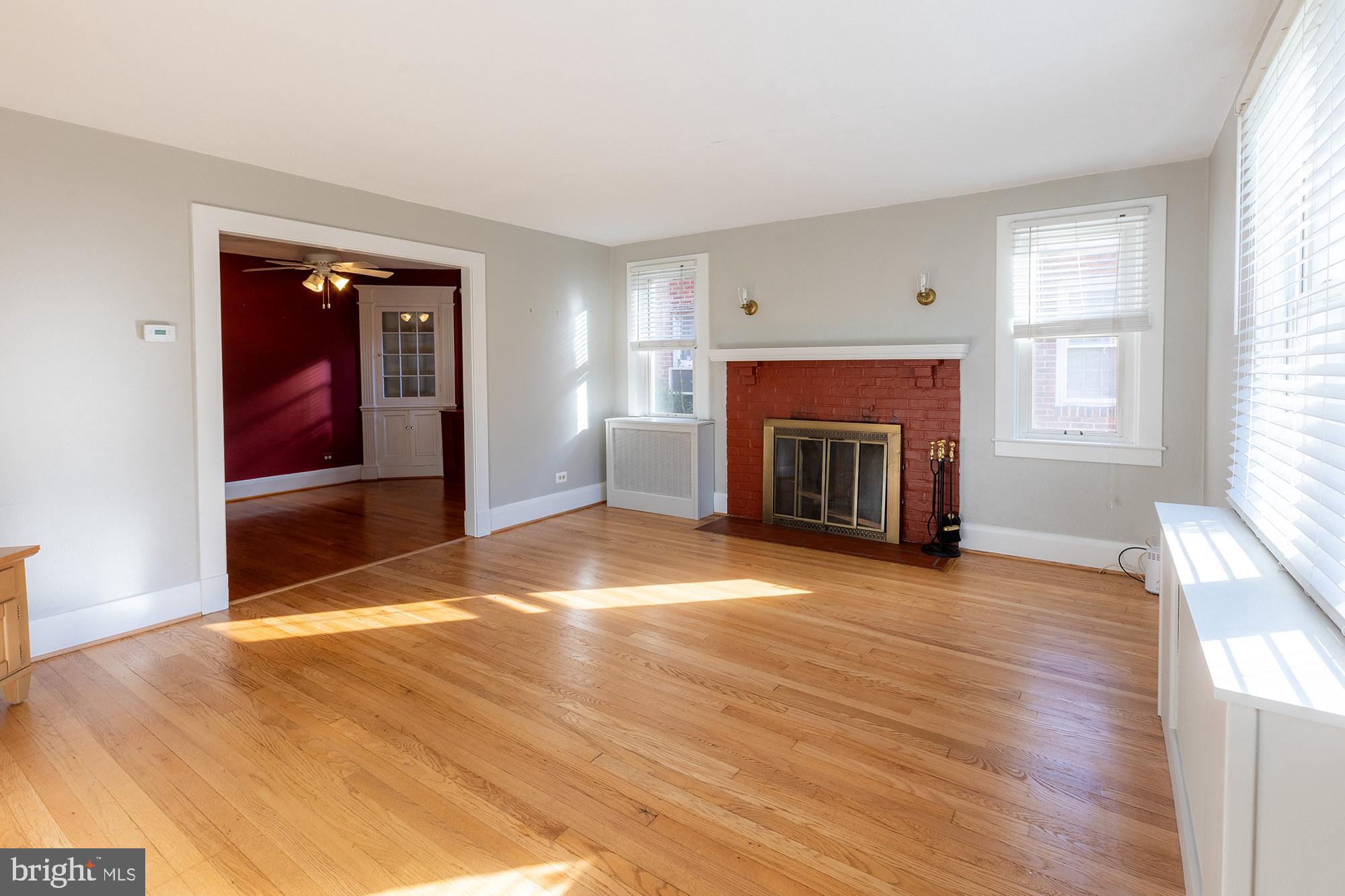 1424 West Joppa Road Towson, MD 21204 - Photo 4 of 30 Living room with wood burning fireplace
