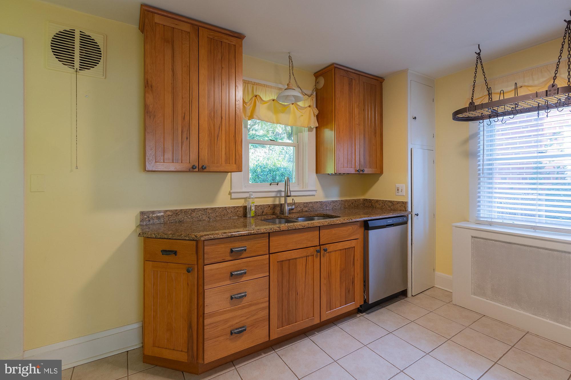 1424 West Joppa Road Towson, MD 21204 - Photo 7 of 30 Hickory cabinets and ceramic tile floors
